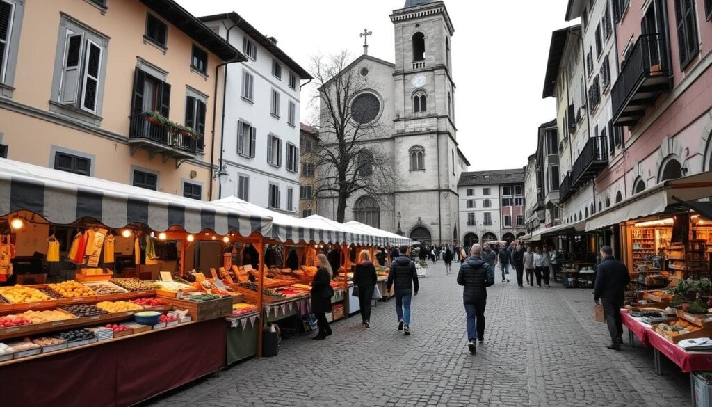 A bustling outdoor market set amidst the historic buildings of Bellinzona's Altstadt. Charming stalls offer an array of local produce, crafts, and delicacies, their wares showcased in a muted palette of pencil-sketch blacks, whites, and pops of color. Cobblestone paths wind through the Piazza Collegiata, flanked by the towering façade of the collegiate church and surrounded by the quaint cafes and shops that line the square. Pedestrians stroll leisurely, immersed in the vibrant atmosphere of this cultural highlight, a scene of Saturday morning vitality in the heart of the old town.
